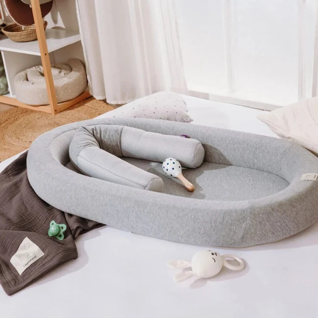 Réducteur de lit bébé Air vert Träumeland